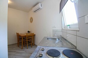 Fridge, stovetop, cookware/dishes/utensils