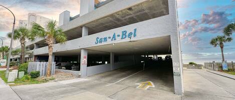 A multi-level parking garage with the sign 'San-A-Bel'.