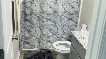 Hair dryer, towels, soap, shampoo