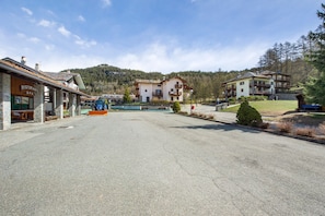 A building with a sign reading 'Ristorante Bar' and a pool in the background. - Holiday Home 'Gioiello Col De Joux' with Mountain View, Private Garden and Wi-Fi (saint vincent)
