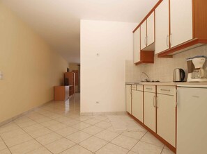 Fridge, stovetop, cookware/dishes/utensils