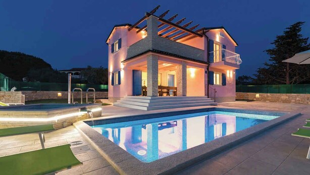 A modern two-story house with a swimming pool, outdoor seating, and a pergola. - Villa with swimming pool, terrace and barbecue (Peroj)