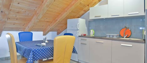 Fridge, stovetop, cookware/dishes/utensils