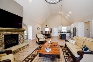 TV, fireplace, table football - Secluded 2-story home with private hot tub, game room, fireplace, firepit, decks (Blairsville)