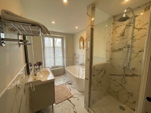 Shower, hair dryer, towels, soap