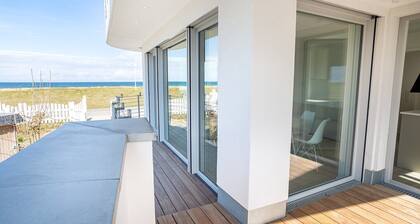 Appartement 'Ferienwohnung Backbord' avec vue sur la mer, jardin partagé et Wi-Fi