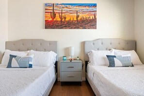 4 bedrooms, desk, iron/ironing board, travel cot
