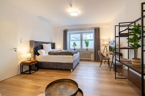 Appart'hôtel Ville | 2 chambres, literie hypoallergénique, ameublement personnalisé, bureau