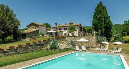"In the green heart of Umbria, cozy apartment in a farmhouse with pool."