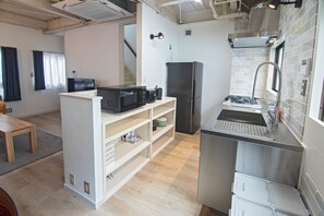 Comfort Villa | Private kitchen | Full-sized fridge, microwave, rice cooker, cookware/dishes/utensils - Tabi Time Nishinagahori  (Osaka)