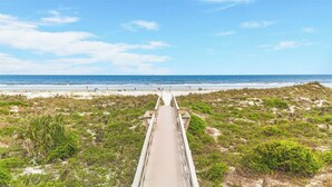 A boardwalk leading to a beach with a clear view of the ocean. - 3 bedroom Ocean Front with amazing ocean views! (Saint Augustine)