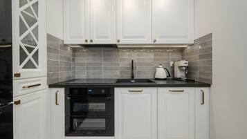 Réfrigérateur, four, plaque de cuisson, lave-vaisselle