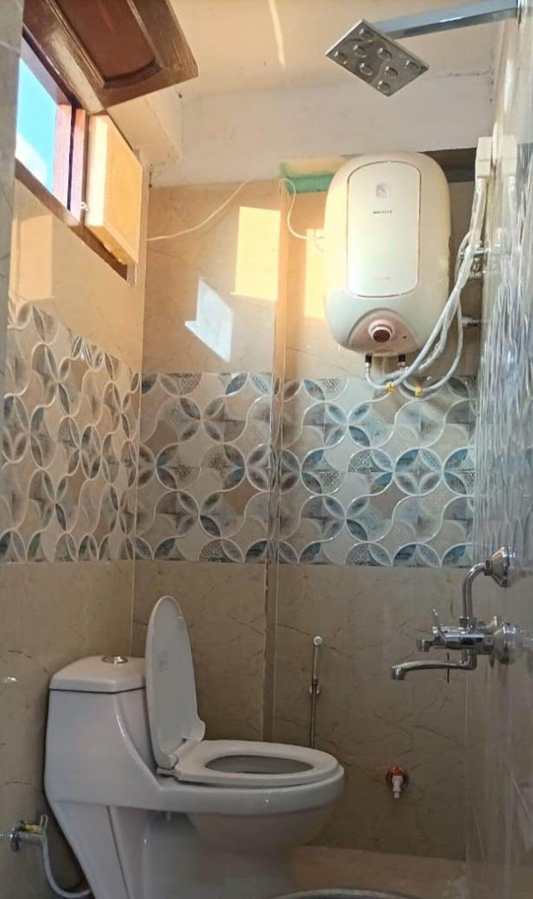 Shower, rainfall showerhead, towels, soap