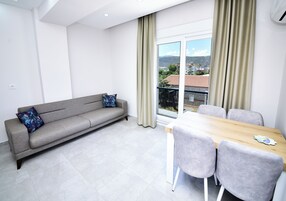 Basic Apartment | Private kitchen | Fridge, stovetop, dishwasher, highchair
