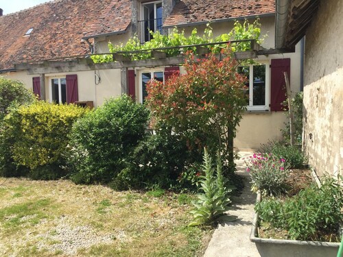 Spacious cottage with fireplace and game room