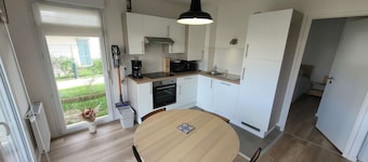 Charming modern apartment with garden and private parking