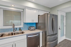 Oven, stovetop, coffee/tea maker, cookware/dishes/utensils