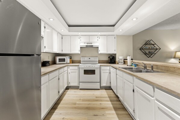 Fridge, microwave, oven, stovetop - Ground Floor Unit With Large Dining Area And Patio Designed For Gatherings! (St. Augustine)