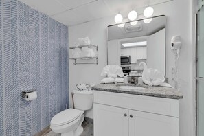 Shower, hair dryer, towels