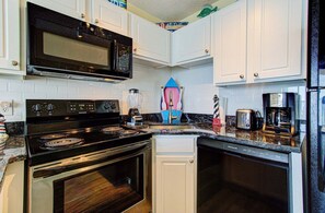 Condo, 1 Bedroom | Private kitchen | Fridge, oven, coffee/tea maker