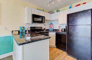 Condo, 1 Bedroom | Private kitchen | Fridge, oven, coffee/tea maker - 1003 Ocean Breeze 1 Bedroom Home (Carolina Beach)