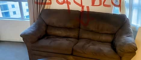 Economy Apartment | Living area | 21-inch TV with digital channels, computer monitors