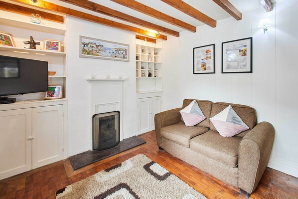 Télévision, cheminée, espaces bureaux