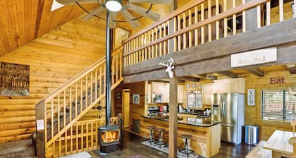 A real log cabin in the pines with a huge game room and a jacuzzi tub!