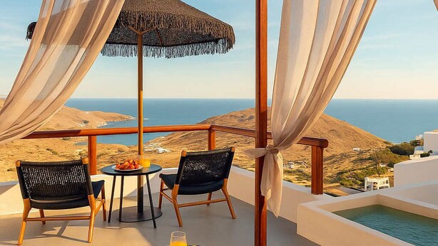 A terrace with a view of the sea, two chairs, a table with fruit and juice, and a small pool. - Santorini Luxury Suite w/ Rooftop HotTub & SeaView (Akrotiri, Santorini)
