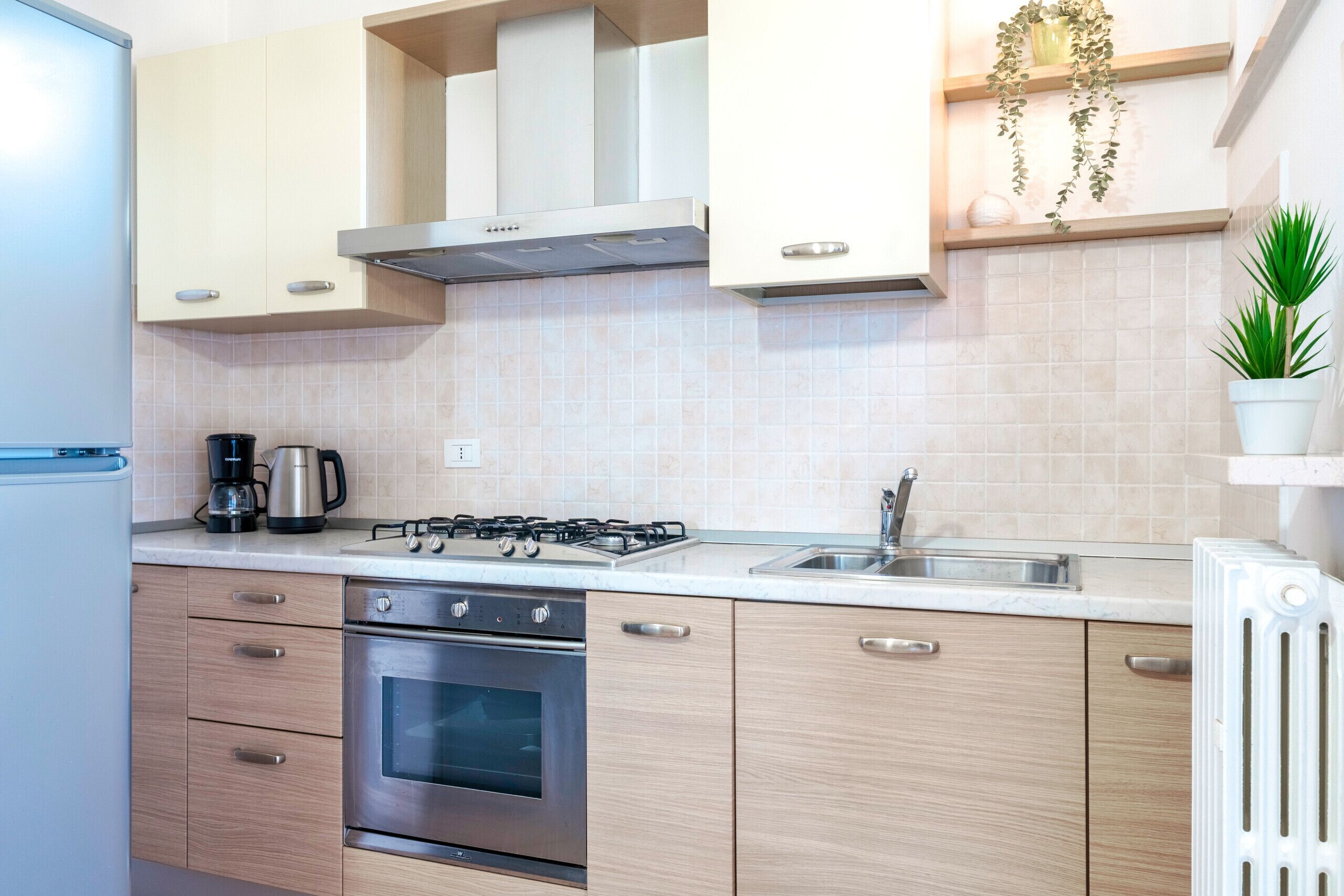 Fridge, oven, coffee/tea maker, toaster