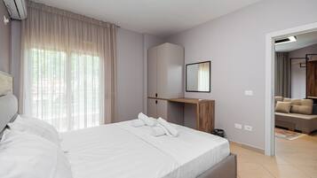 Familiesuite | Pengeskab på værelset, lydisolering, gratis Wi-Fi, sengetøj