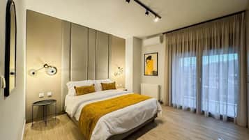 Deluxe tweepersoonskamer | Woonruimte | Een 35-inch smart-tv met digitale zenders