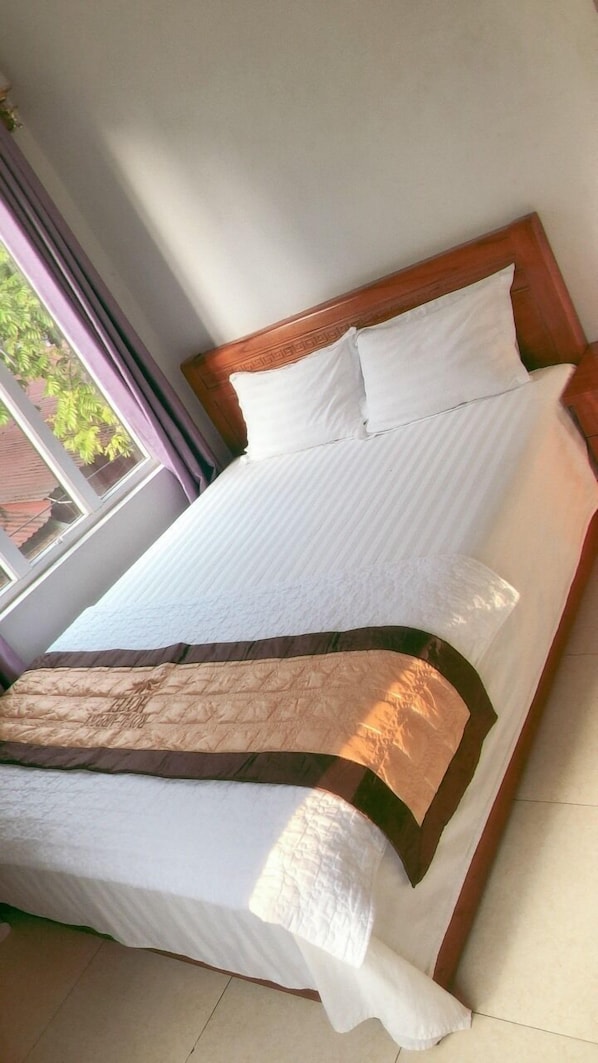 Chambre Simple Standard | Literie de qualité supérieure, matelas Select Comfort, draps fournis