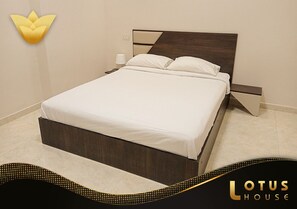 Standard Apartment | 3 bedrooms, in-room safe, soundproofing, iron/ironing board - Lotus Building  (New Cairo)
