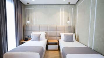 Kamar Double atau Twin Deluks | 1 kamar tidur, seprai premium, busa memori, dan minibar