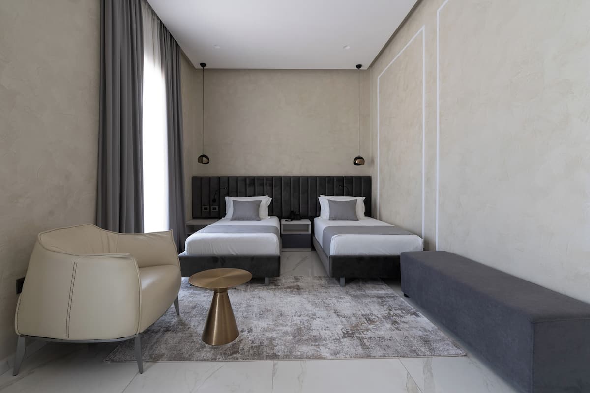 Habitació doble o amb dos llits individuals Deluxe | 1 dormitori i roba de llit d'alta qualitat