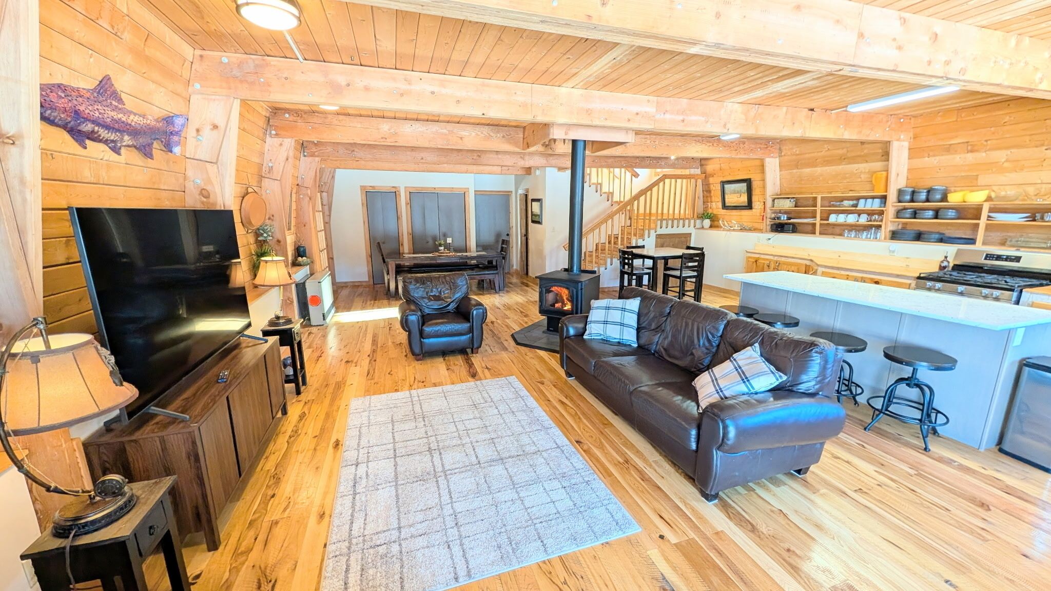 Main gathering space. Open kitchen, dining, and living room.