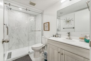 Hair dryer, towels, soap, toilet paper