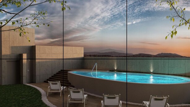 A modern outdoor pool area with a view of distant mountains, surrounded by concrete structures and equipped with lounge chairs. - Cozy studio with AC and WiFi in enchanting San José (San José)