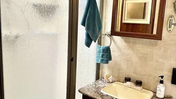 Shower, towels, soap, shampoo