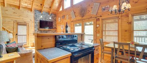 Fridge, stovetop, dishwasher, coffee/tea maker