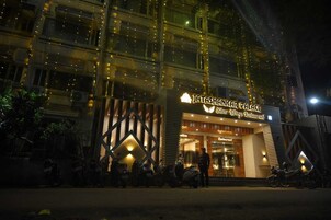 A building with a sign reading "Jatashankar Palace Silver Wings Restaurant."