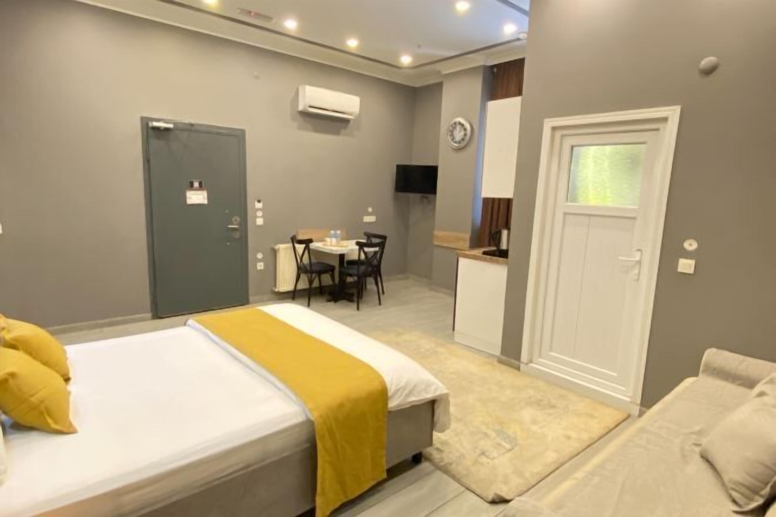 Premium bedding, memory foam beds, in-room safe, laptop workspace