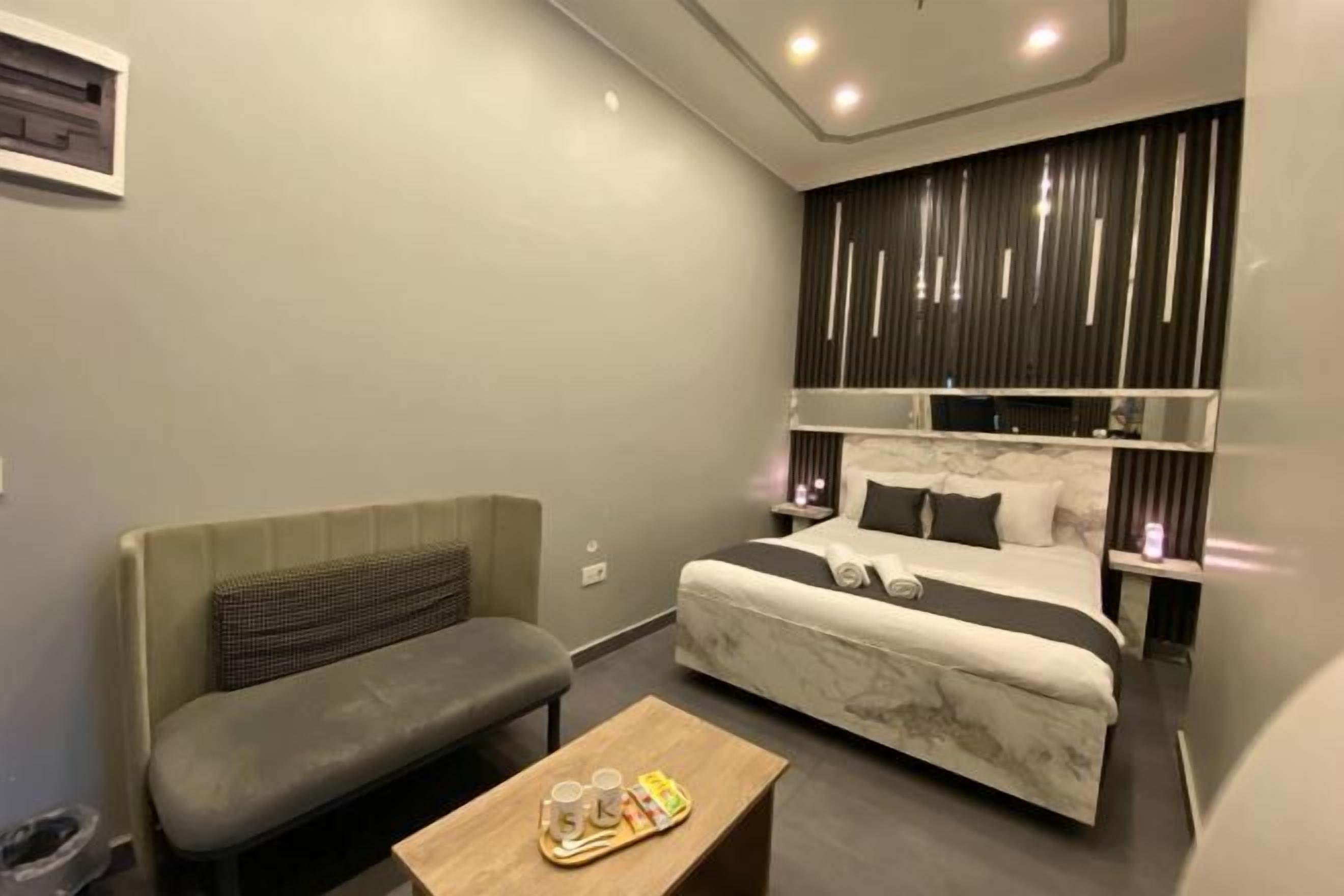 Premium bedding, memory foam beds, in-room safe, laptop workspace