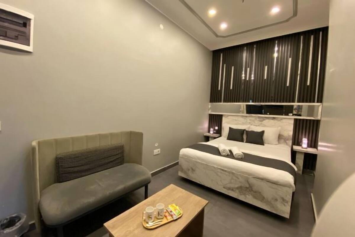 Premium bedding, memory foam beds, in-room safe, laptop workspace