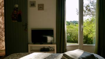 1 chambre, fer et planche Ă repasser, Wi-Fi gratuit, draps fournis