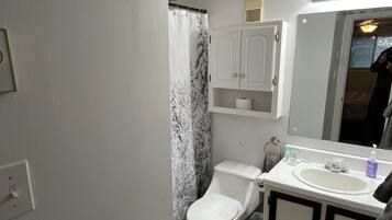 Hair dryer, towels, soap, shampoo