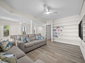 TV, books - Sea Glass (B) Upscale Beachfront Retreat & Pool - 5BR (Emerald Isle)