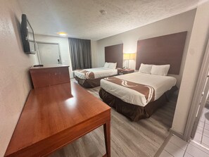 Coffres-forts dans les chambres, bureau, fer et planche à repasser