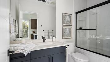 Hair dryer, towels, soap, shampoo